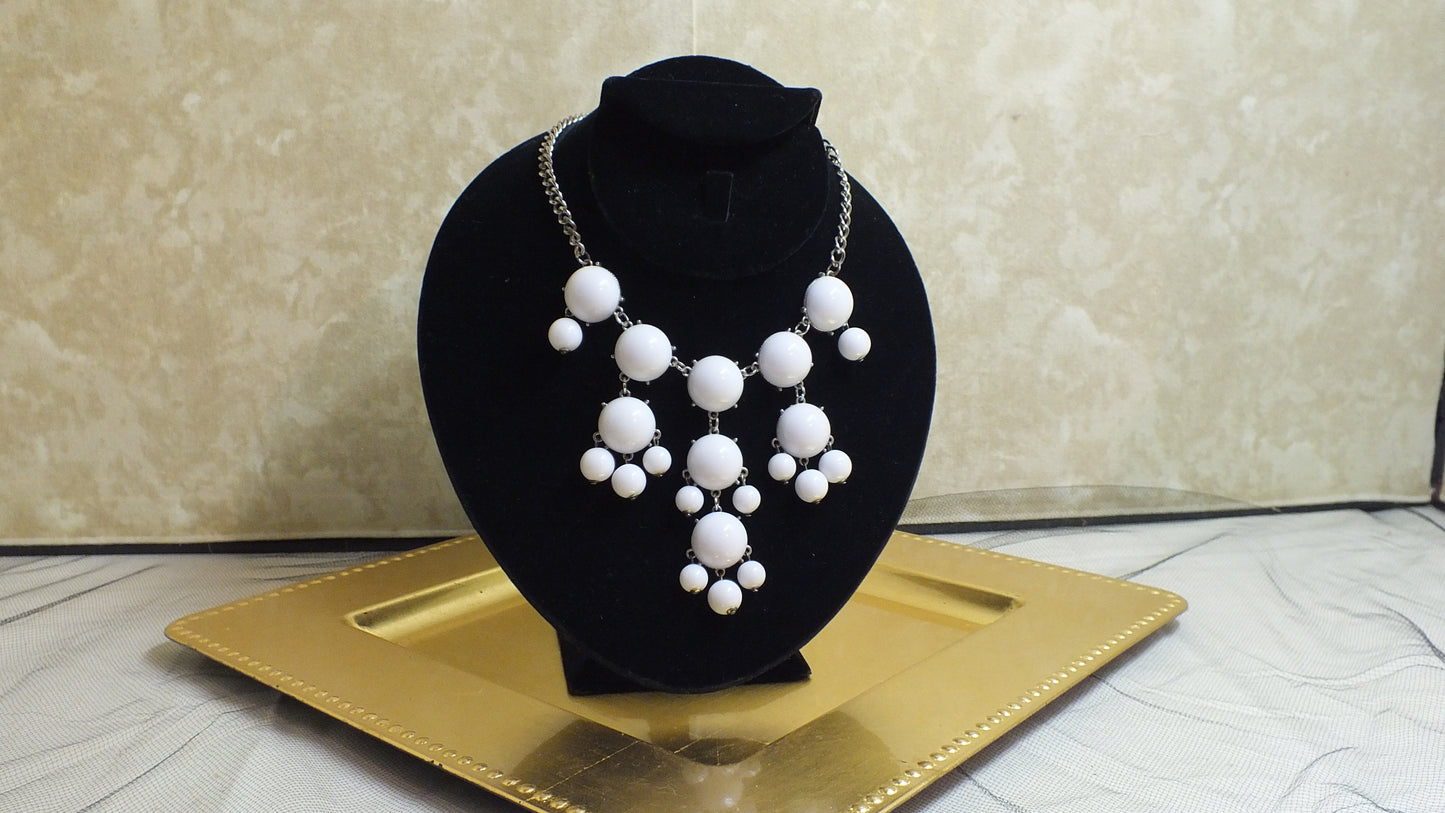 J2400001 - White bubble necklace with lobster claw clasp.